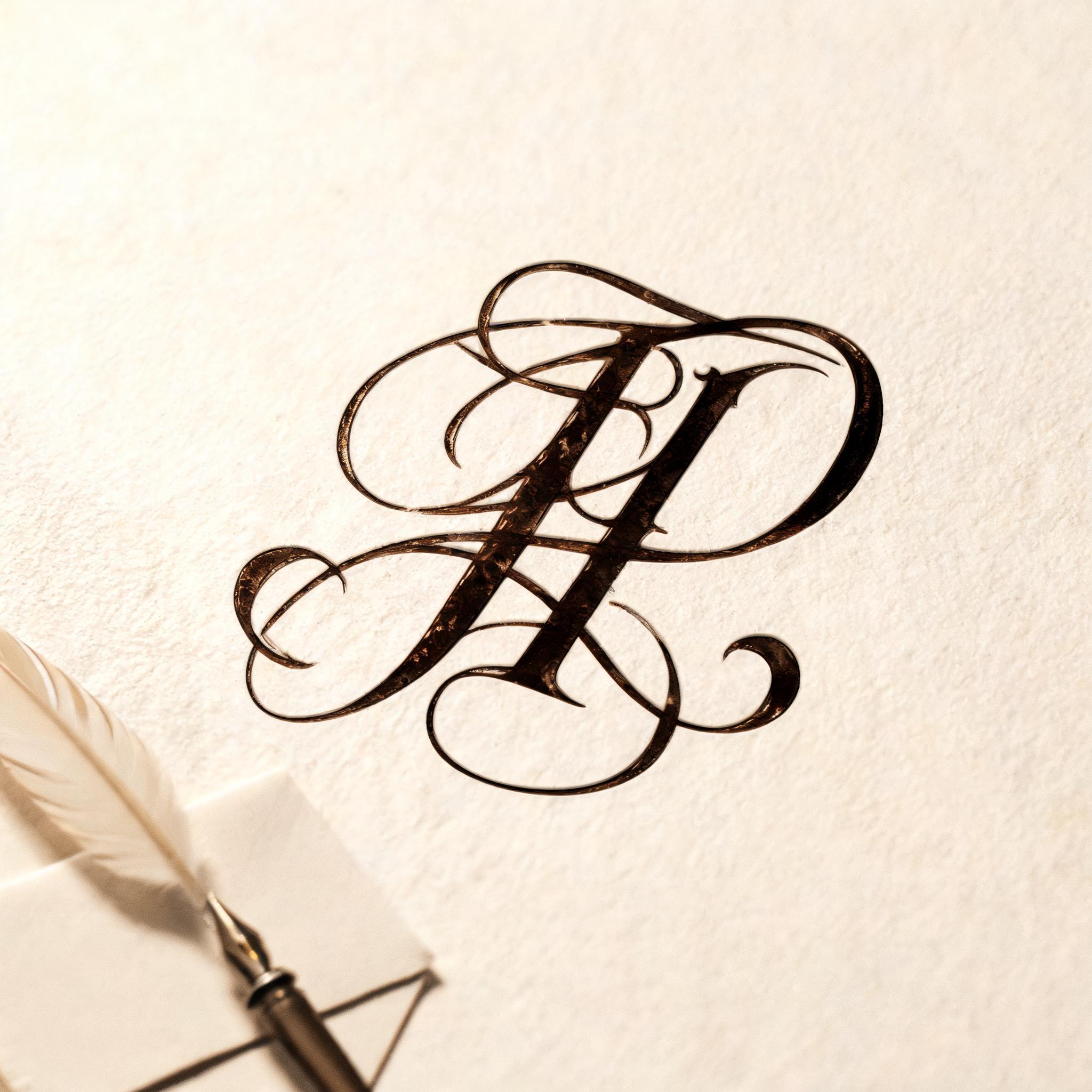 "JP" — Cursive text effect