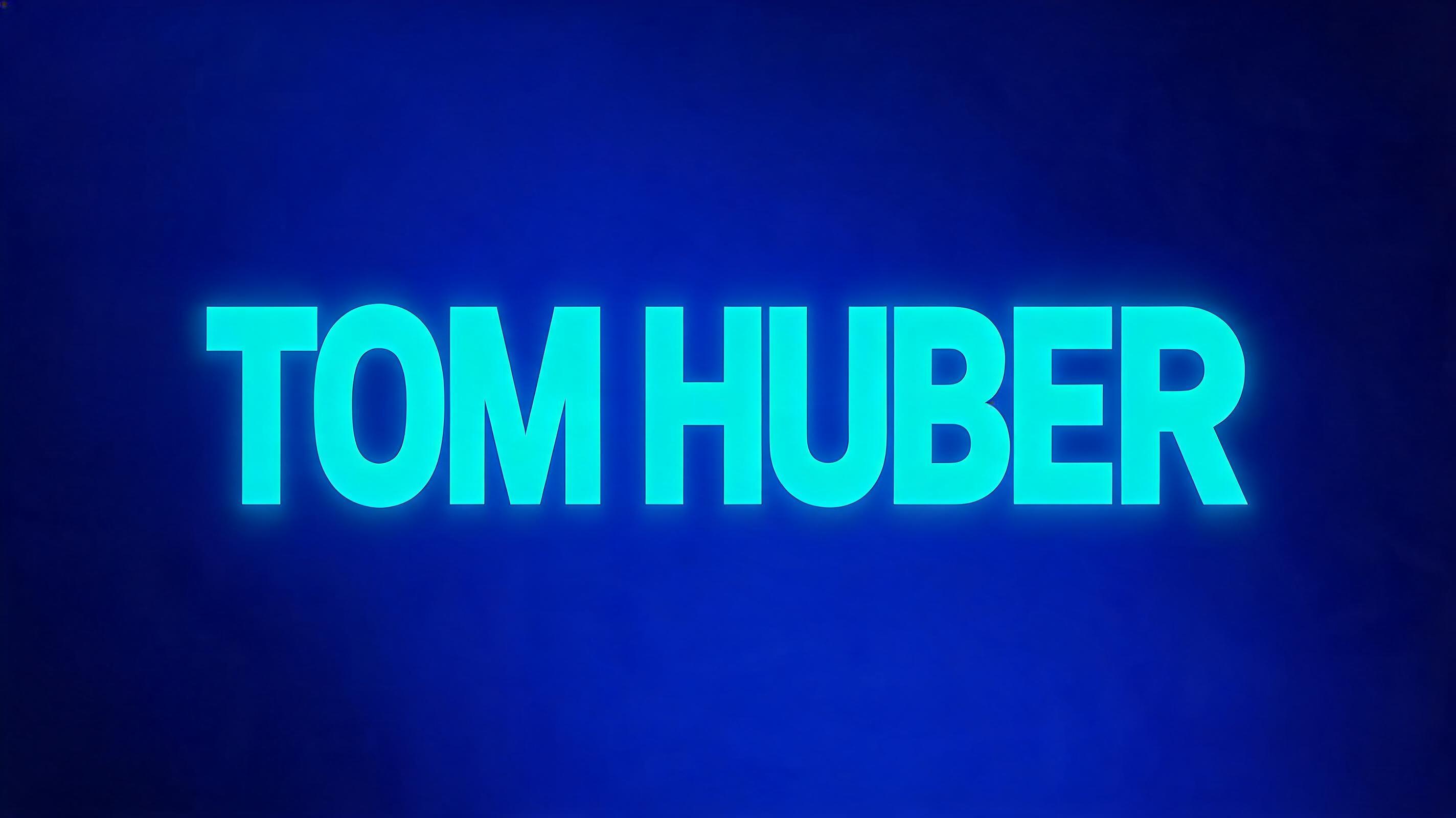 "TOM HUBER" — Gothic text effect