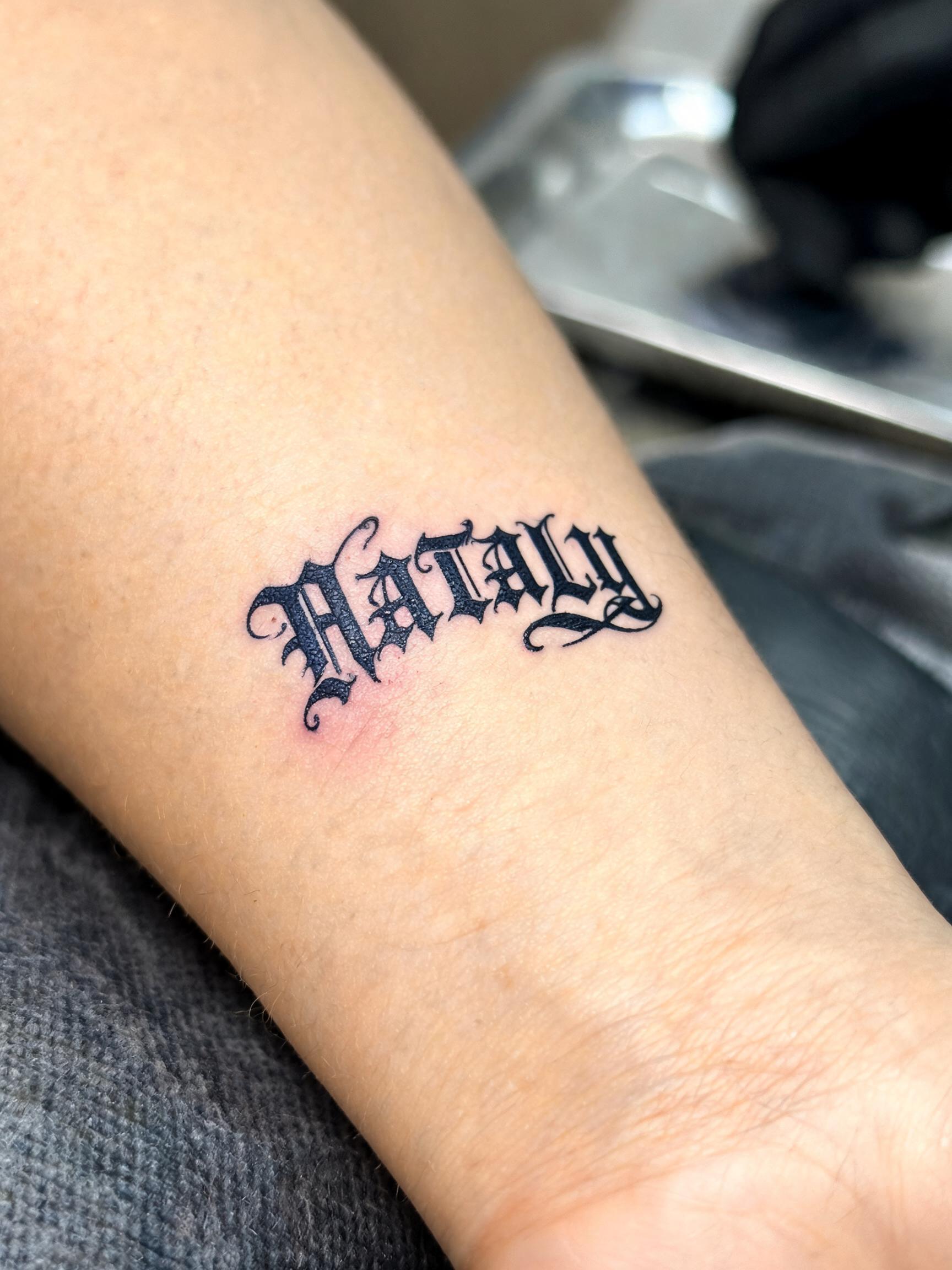 "Nataly" — Tattoo | AI Text Effect Generator