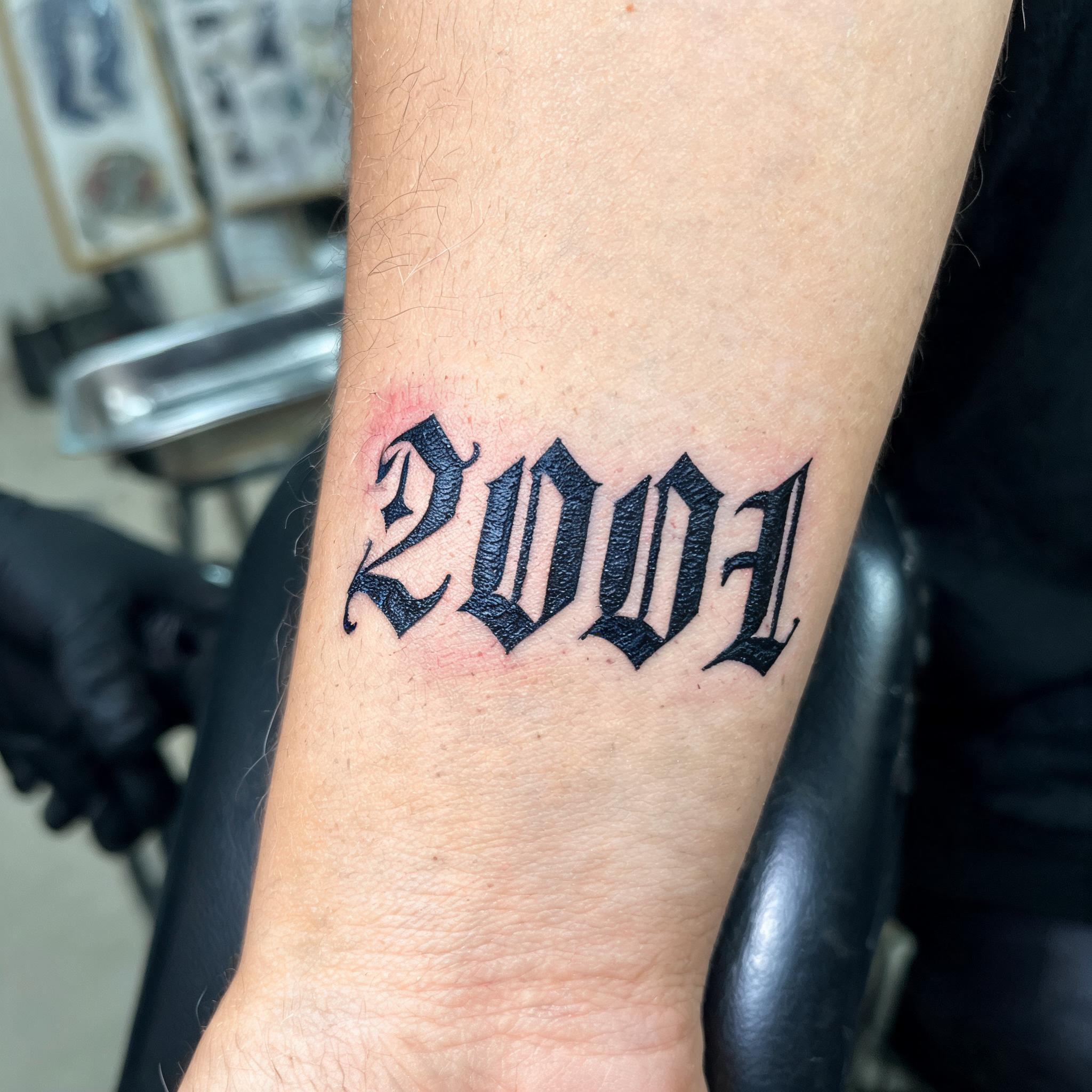"2001" — Tattoo | AI Text Effect Generator