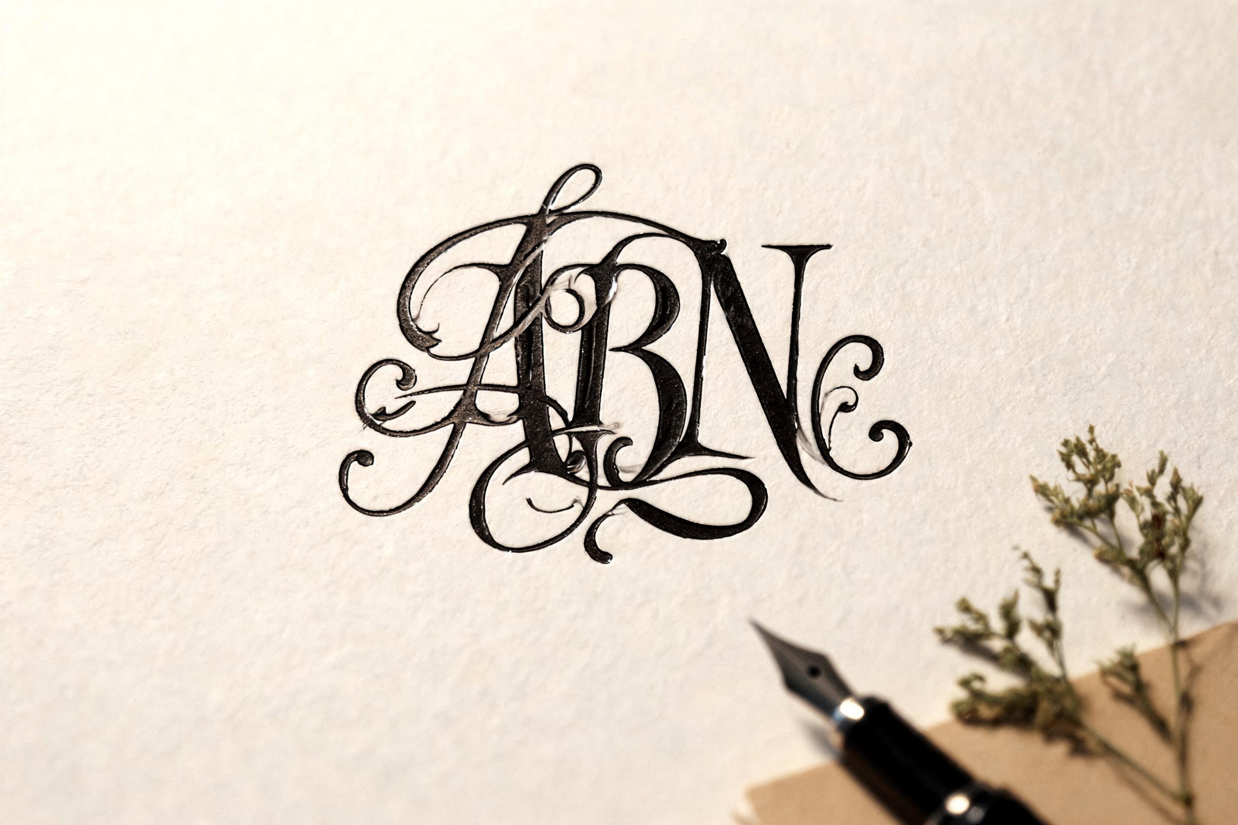 "ABN" — Cursive text effect
