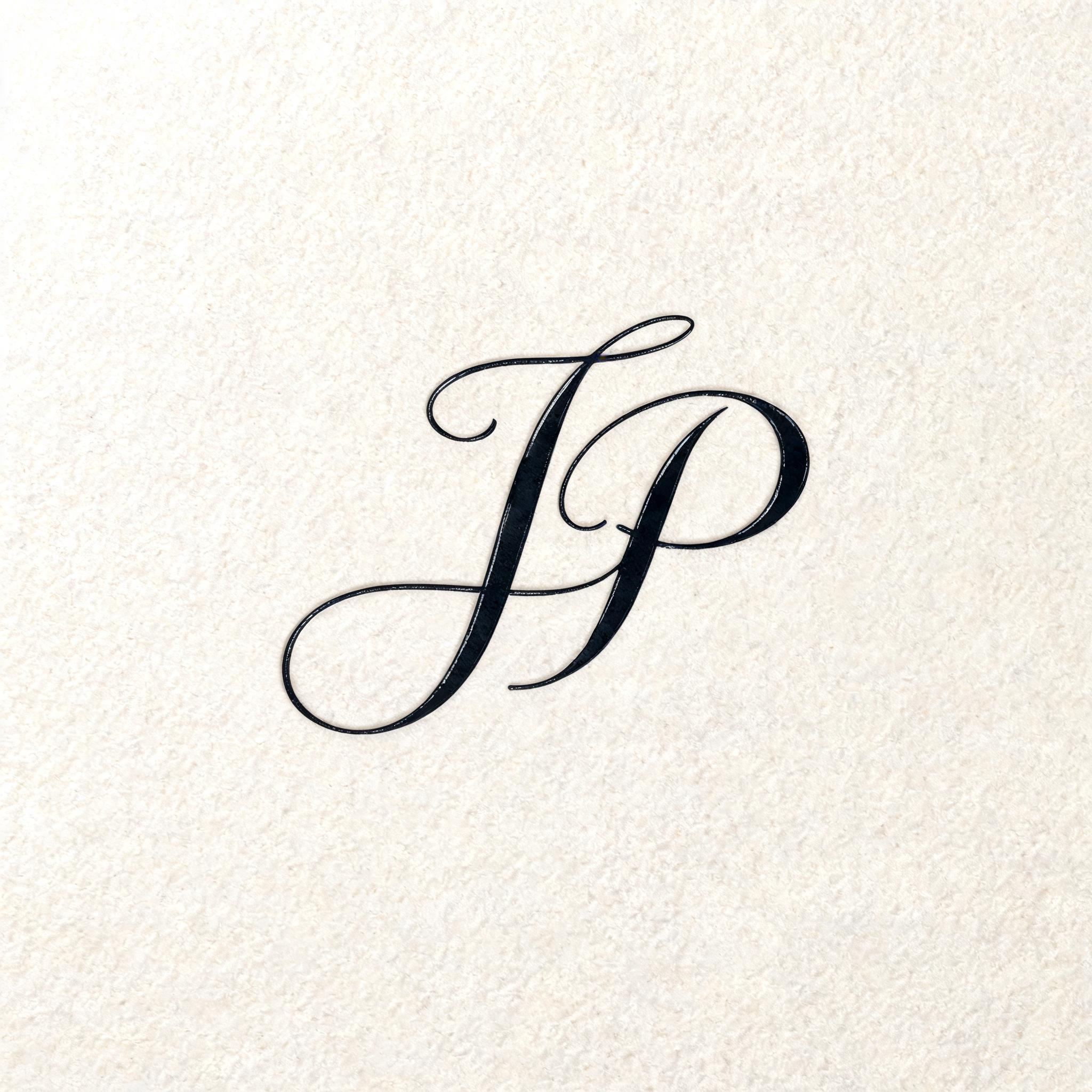 "JP" — Cursive text effect