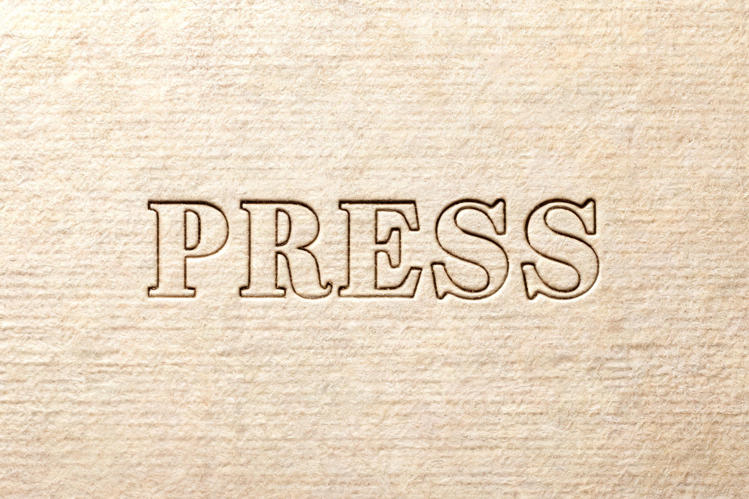 "PRESS" — Emboss | AI Text Effect Generator