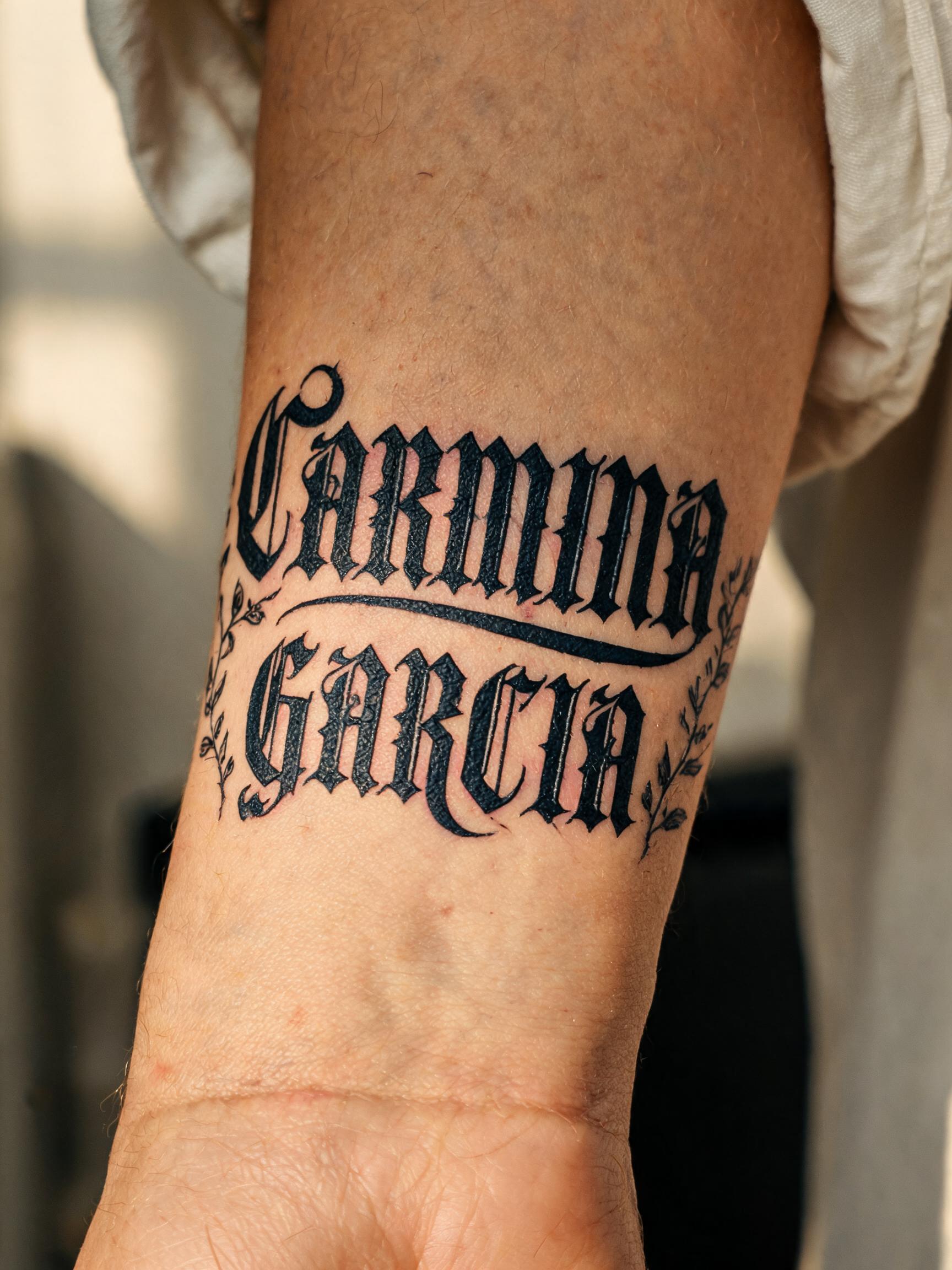 "Carmina Garcia" — Tattoo | AI Text Effect Generator