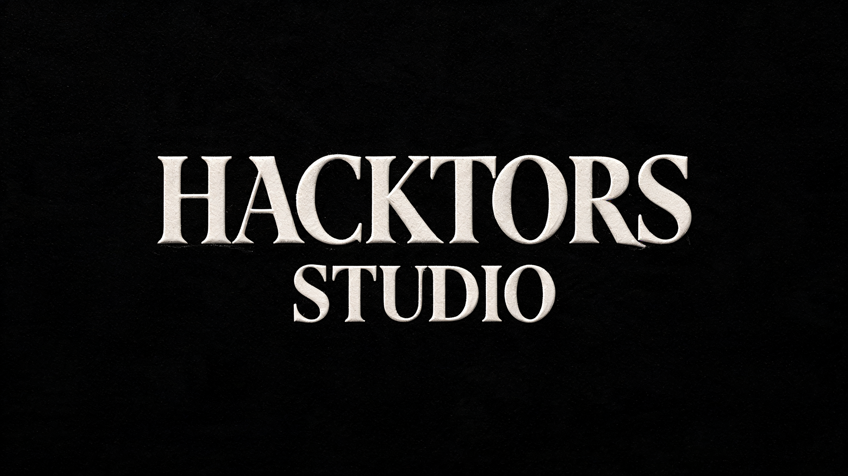 "HACKTORS STUDIO" — Emboss text effect