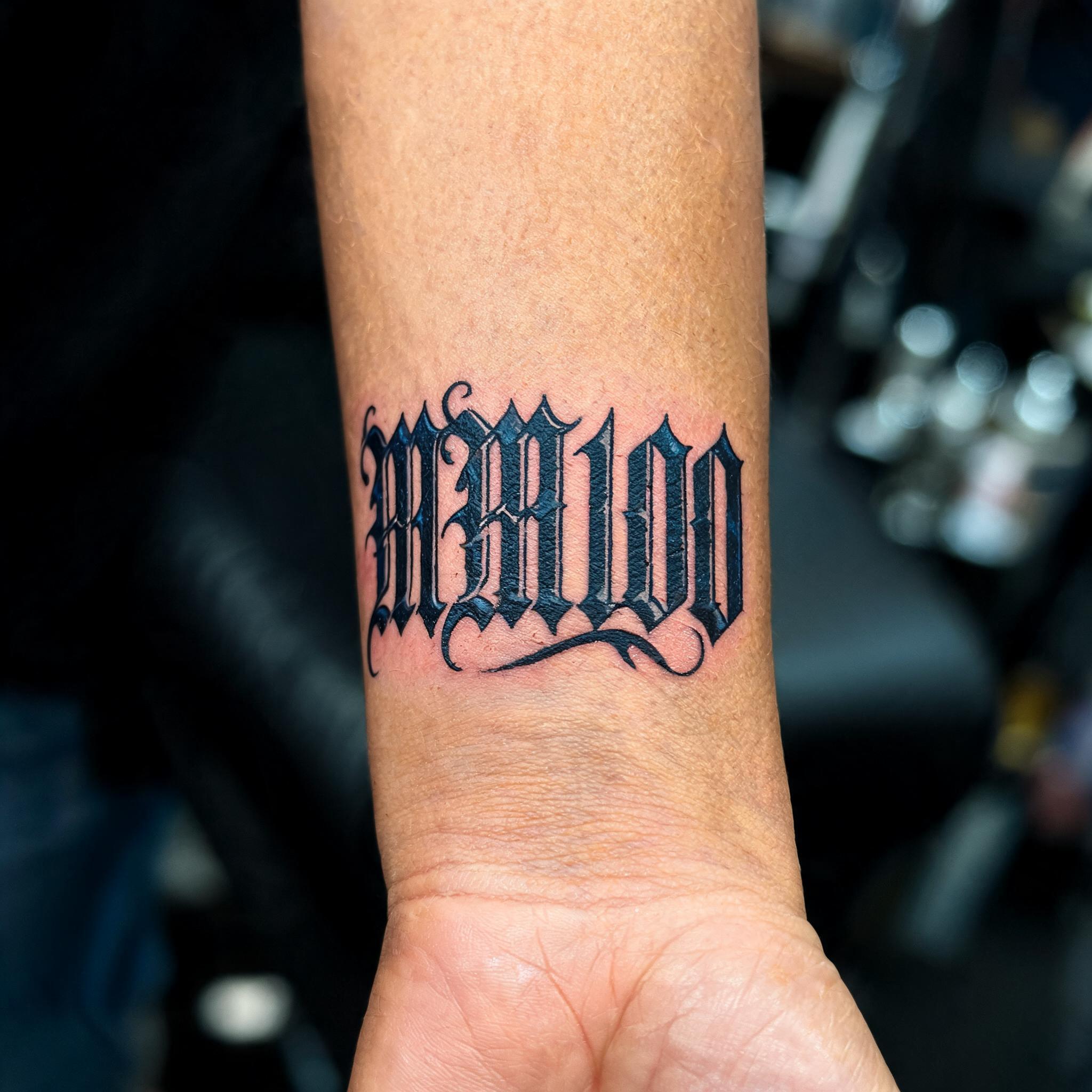 "MM100" — Tattoo | AI Text Effect Generator