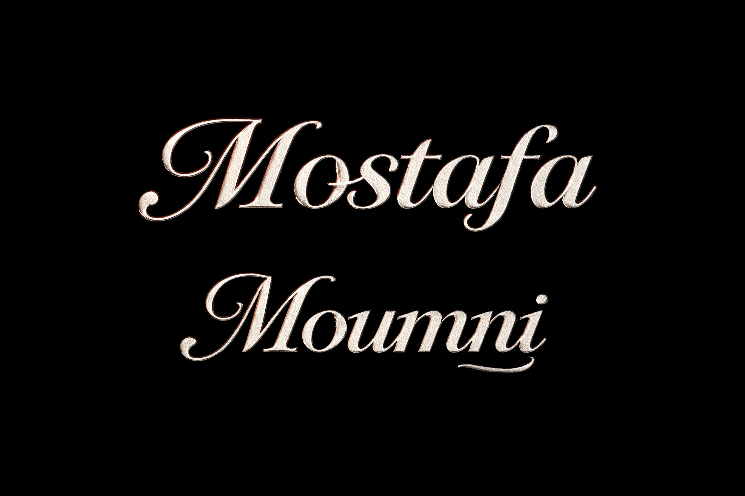 "Mostafa Moumni" — Emboss text effect