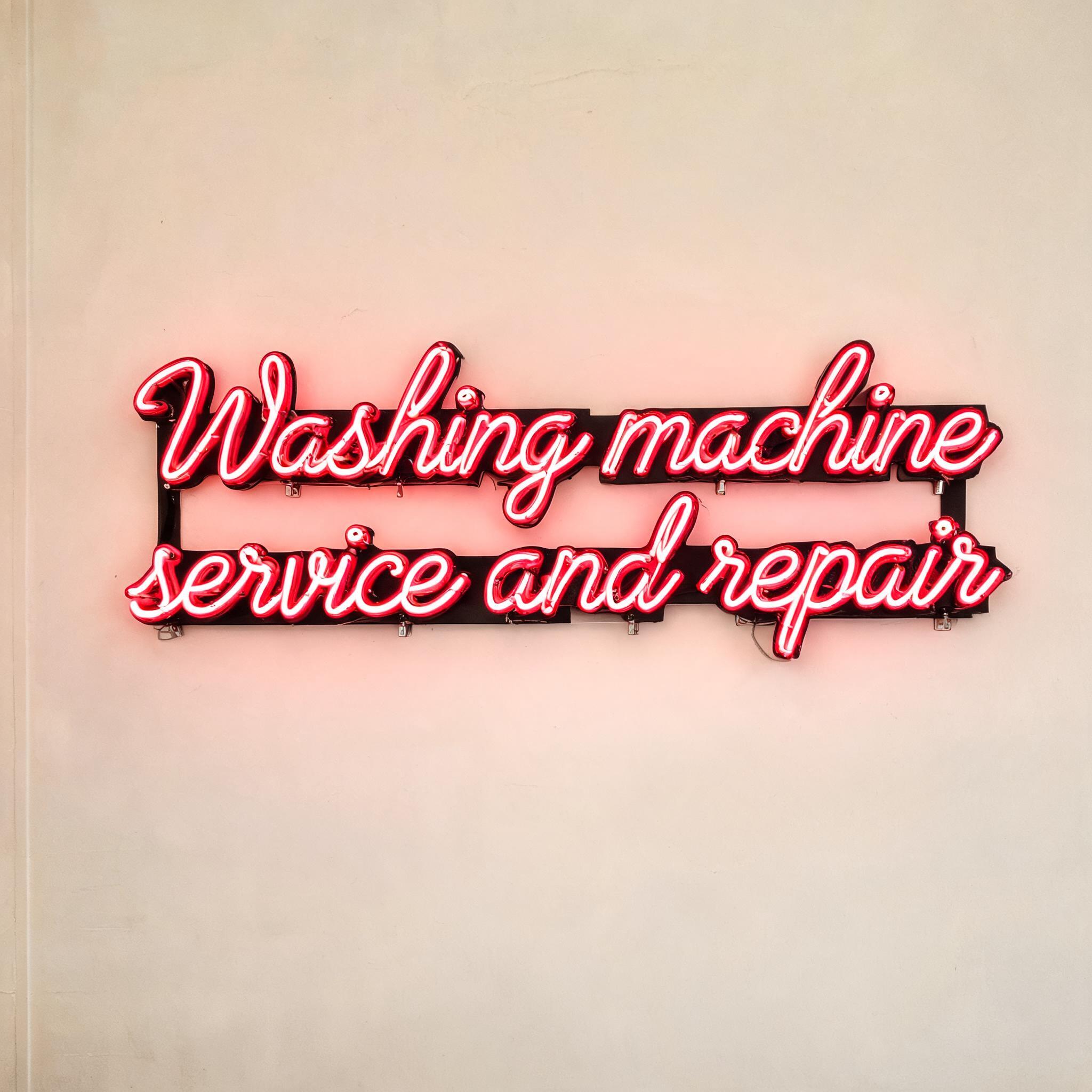 "Washing machine service and repair" — Neon Sign | AI Text Effect Generator