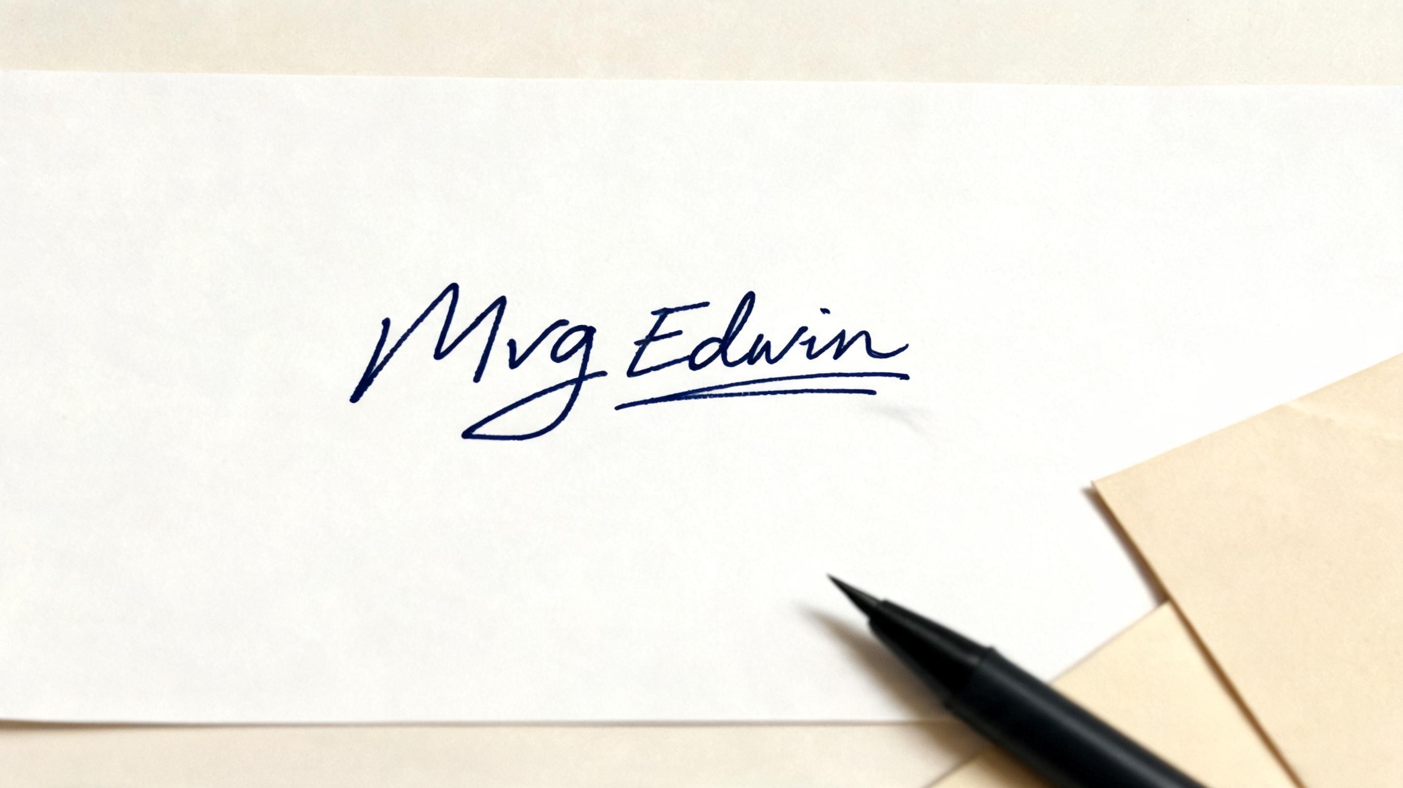 "Mvg Edwin" — Cursive Signature | AI Text Effect Generator
