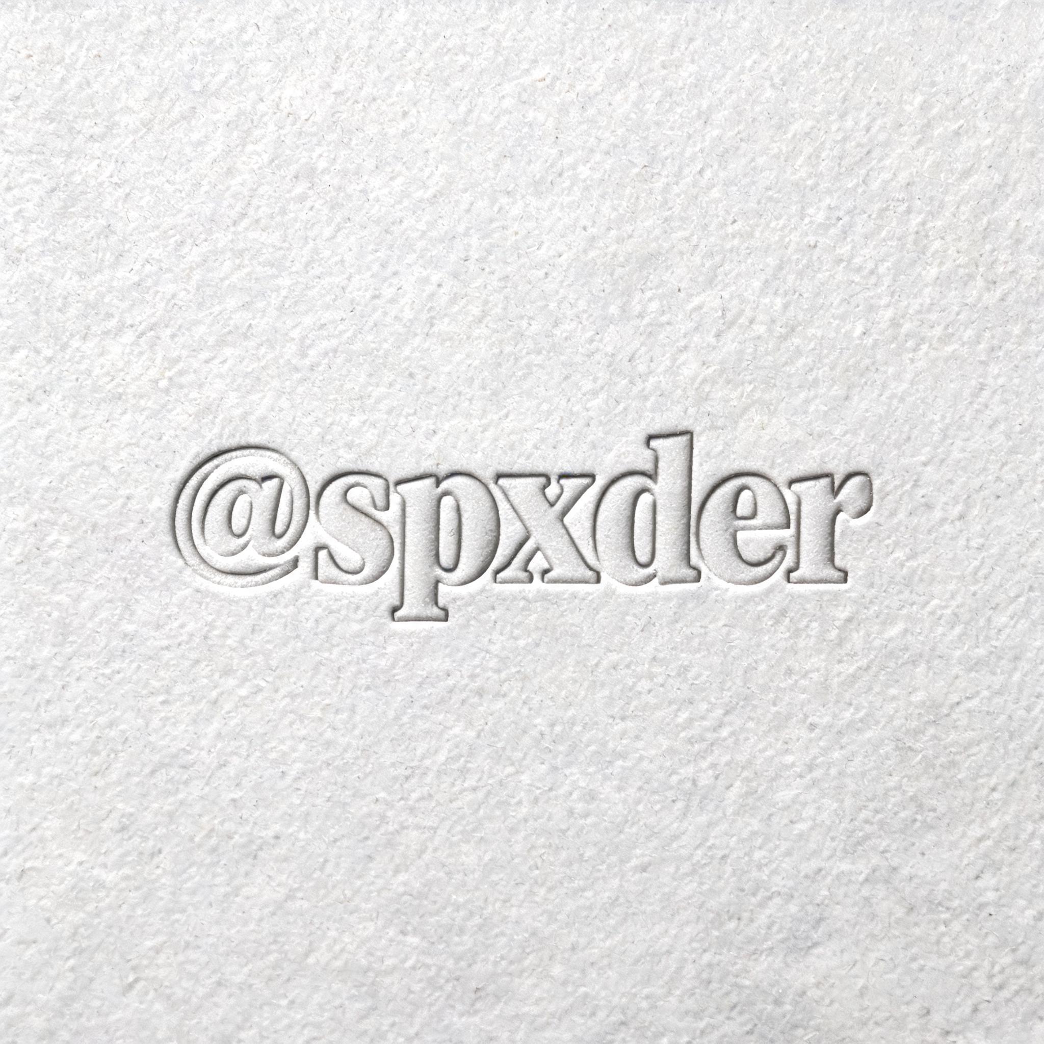 "​@spxder" — Emboss | AI Text Effect Generator